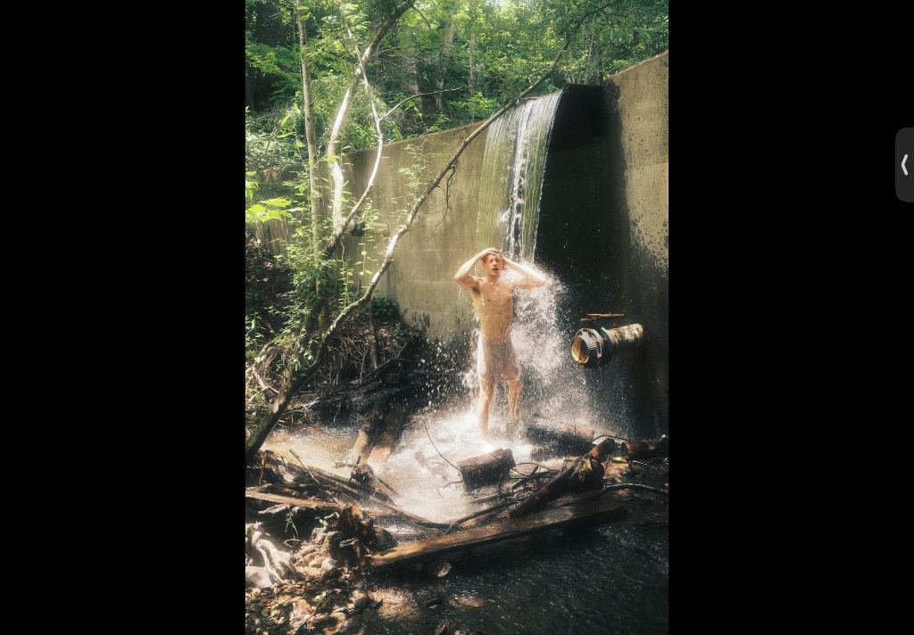 Under the waterfall